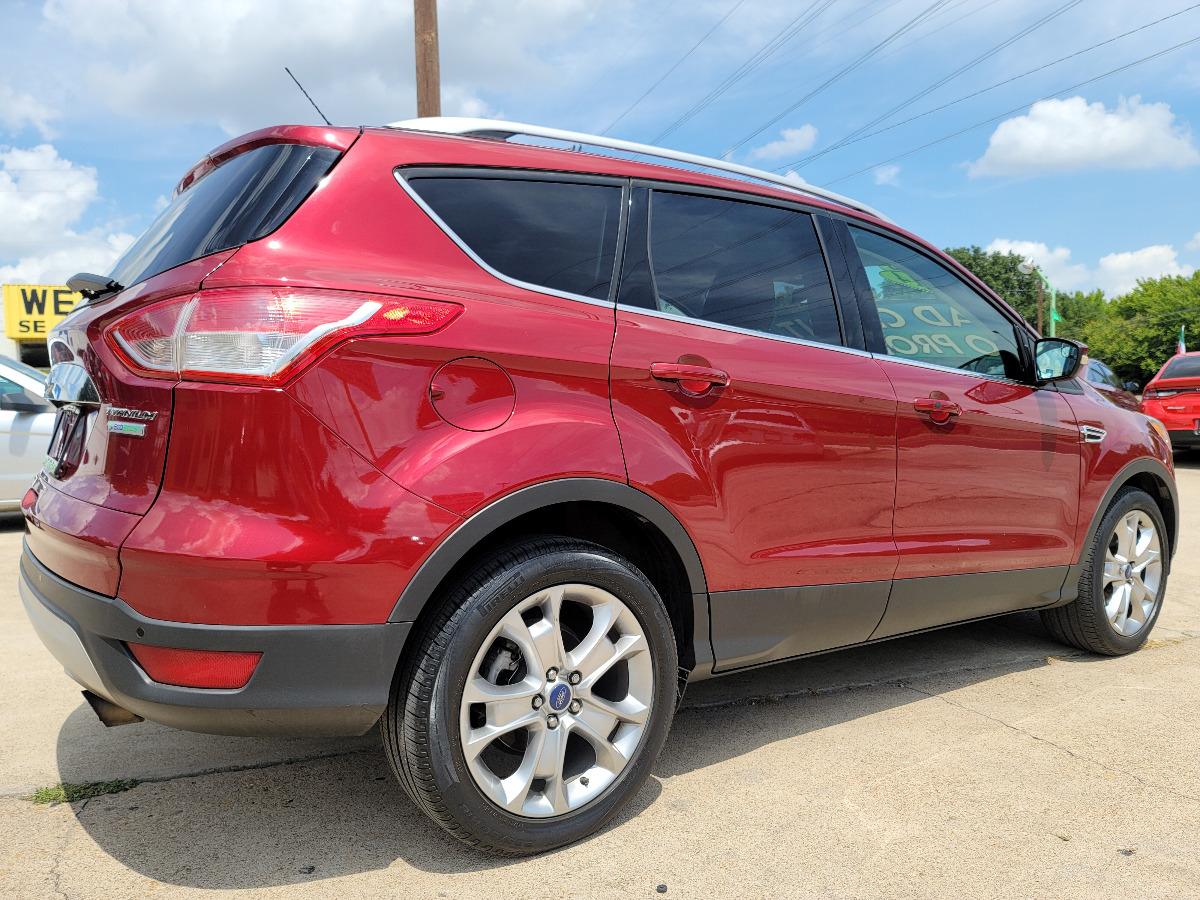 2014 RED /BEIGE Ford Escape Titanium (1FMCU0J98EU) with an 2.0L L4 DOHC 16V engine, 6-Speed Automatic transmission, located at 2660 S.Garland Avenue	, Garland, TX, 75041, (469) 298-3118, 32.885387, -96.656776 - CASH$$$$ ESCAPE TITANIUM!! This is a Super Clean 2014 FORD ESCAPE TITANIUM SUV! NAVIGATION! BACK UP CAMERA! HEATED/LEATHER SEATS! BLUETOOTH! SAT RADIO! SUPER CLEAN! MUST SEE! Come in for a test drive today. We are open from 10am-7pm Monday-Saturday. Call us with any questions at 469-202-7468, - Photo #2