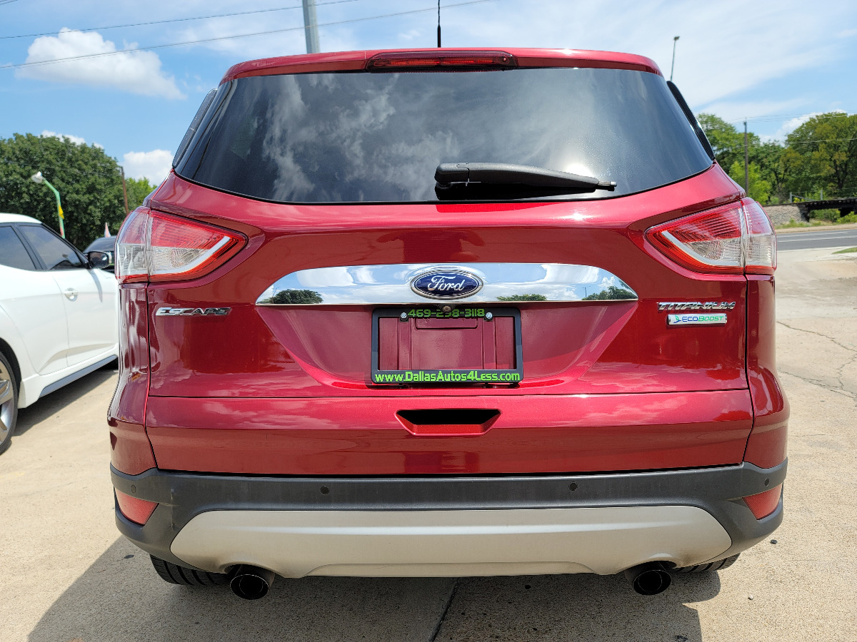 2014 RED /BEIGE Ford Escape Titanium (1FMCU0J98EU) with an 2.0L L4 DOHC 16V engine, 6-Speed Automatic transmission, located at 2660 S.Garland Avenue	, Garland, TX, 75041, (469) 298-3118, 32.885387, -96.656776 - CASH$$$$ ESCAPE TITANIUM!! This is a Super Clean 2014 FORD ESCAPE TITANIUM SUV! NAVIGATION! BACK UP CAMERA! HEATED/LEATHER SEATS! BLUETOOTH! SAT RADIO! SUPER CLEAN! MUST SEE! Come in for a test drive today. We are open from 10am-7pm Monday-Saturday. Call us with any questions at 469-202-7468, - Photo #3