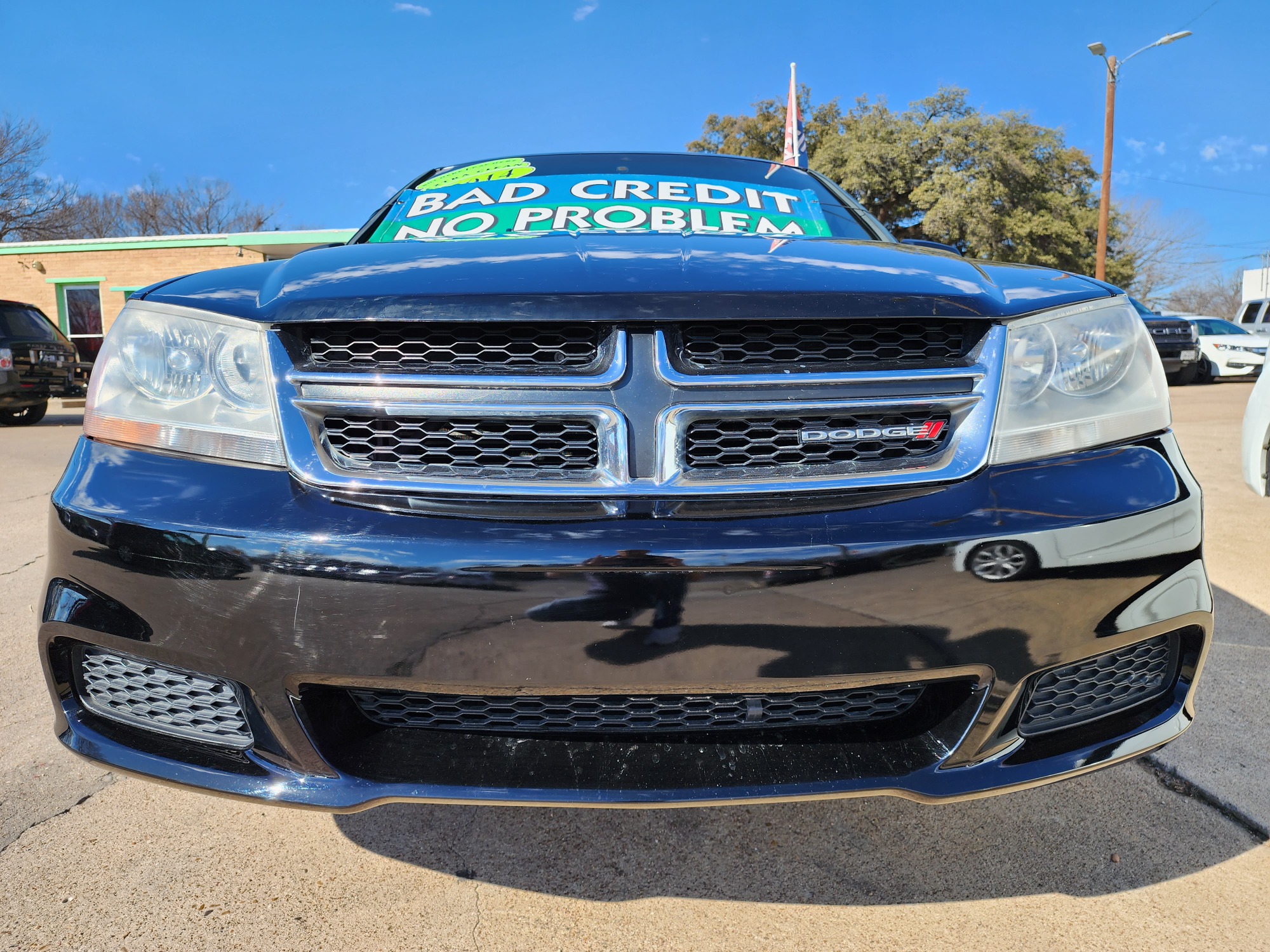 2014 BLACK Dodge Avenger SE (1C3CDZAB6EN) with an 2.4L L4 DOHC 16V engine, 4-Speed Automatic transmission, located at 2660 S.Garland Avenue, Garland, TX, 75041, (469) 298-3118, 32.885551, -96.655602 - Welcome to DallasAutos4Less, one of the Premier BUY HERE PAY HERE Dealers in the North Dallas Area. We specialize in financing to people with NO CREDIT or BAD CREDIT. We need proof of income, proof of residence, and a ID. Come buy your new car from us today!! This is a very clean 2014 DODGE AVENG - Photo #9