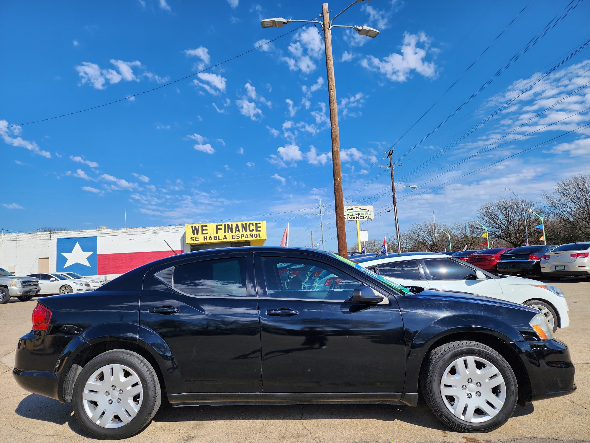 2014 BLACK Dodge Avenger SE (1C3CDZAB6EN) with an 2.4L L4 DOHC 16V engine, 4-Speed Automatic transmission, located at 2660 S.Garland Avenue, Garland, TX, 75041, (469) 298-3118, 32.885551, -96.655602 - Welcome to DallasAutos4Less, one of the Premier BUY HERE PAY HERE Dealers in the North Dallas Area. We specialize in financing to people with NO CREDIT or BAD CREDIT. We need proof of income, proof of residence, and a ID. Come buy your new car from us today!! This is a very clean 2014 DODGE AVENG - Photo #2