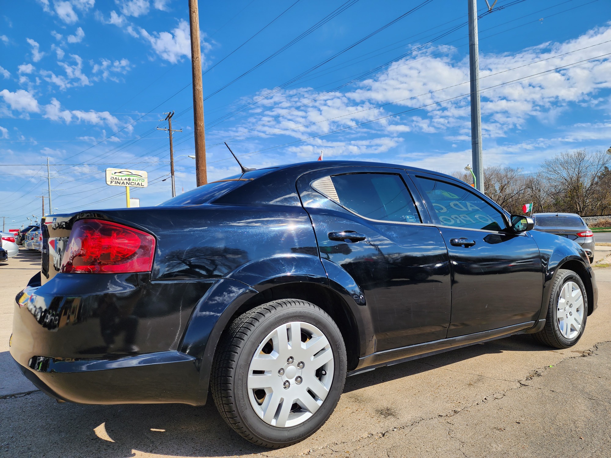 2014 BLACK Dodge Avenger SE (1C3CDZAB6EN) with an 2.4L L4 DOHC 16V engine, 4-Speed Automatic transmission, located at 2660 S.Garland Avenue, Garland, TX, 75041, (469) 298-3118, 32.885551, -96.655602 - Welcome to DallasAutos4Less, one of the Premier BUY HERE PAY HERE Dealers in the North Dallas Area. We specialize in financing to people with NO CREDIT or BAD CREDIT. We need proof of income, proof of residence, and a ID. Come buy your new car from us today!! This is a very clean 2014 DODGE AVENG - Photo #3