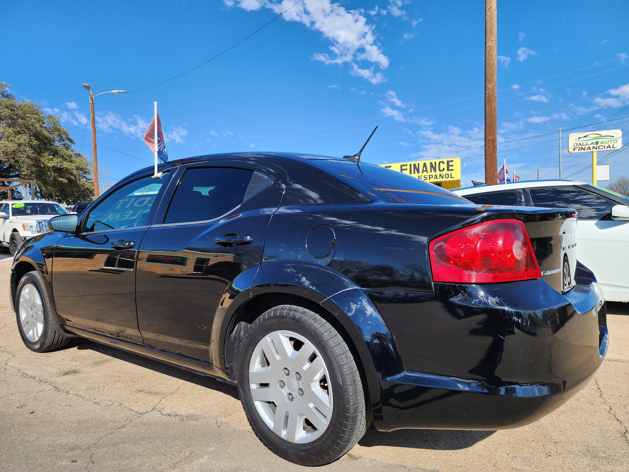 2014 BLACK Dodge Avenger SE (1C3CDZAB6EN) with an 2.4L L4 DOHC 16V engine, 4-Speed Automatic transmission, located at 2660 S.Garland Avenue, Garland, TX, 75041, (469) 298-3118, 32.885551, -96.655602 - Welcome to DallasAutos4Less, one of the Premier BUY HERE PAY HERE Dealers in the North Dallas Area. We specialize in financing to people with NO CREDIT or BAD CREDIT. We need proof of income, proof of residence, and a ID. Come buy your new car from us today!! This is a very clean 2014 DODGE AVENG - Photo #5